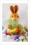 Toy bunny with candy eggs by Anonymous