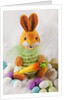 Toy bunny with candy eggs by Anonymous