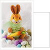 Toy bunny with candy eggs by Anonymous