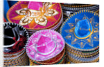 Stacks of souvenir sombreros by Anonymous