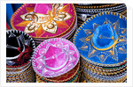 Stacks of souvenir sombreros by Anonymous
