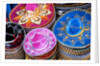 Stacks of souvenir sombreros by Anonymous