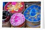 Stacks of souvenir sombreros by Anonymous