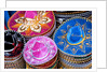 Stacks of souvenir sombreros by Anonymous