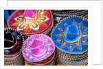 Stacks of souvenir sombreros by Anonymous