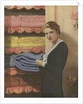 Woman puting away blanket in linen closet by Anonymous