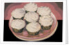 Cupcakes with vanilla frosting by Anonymous