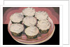Cupcakes with vanilla frosting by Anonymous