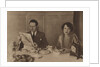 Husband and wife at breakfast by Anonymous