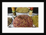 Olive stand in a souk in the medina in Marrakech by Anonymous