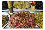 Olive stand in a souk in the medina in Marrakech by Anonymous