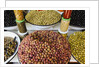 Olive stand in a souk in the medina in Marrakech by Anonymous