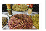 Olive stand in a souk in the medina in Marrakech by Anonymous