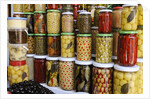 Olive stand in a souk in the medina in Marrakech by Anonymous