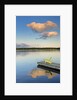 Clouds reflected in Silent Lake with Muskoka chair on dock by Anonymous