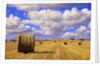 Bales and Clouds Near Sherbrooke, Saskatchewan, Canada. by Anonymous