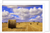 Bales and Clouds Near Sherbrooke, Saskatchewan, Canada. by Anonymous