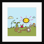 Boy riding tricycle by rabbit warren