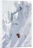 Backcountry skier in mid-jump by Anonymous