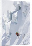 Backcountry skier in mid-jump by Anonymous