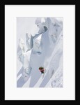 Backcountry skier in mid-jump by Anonymous