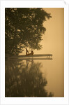 Adirondack chair on dock by Anonymous