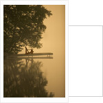 Adirondack chair on dock by Anonymous