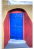 Colorful building in Oia on Santorini in the Greek Isles by Anonymous