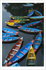 Canoes floating on water by Anonymous