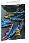 Canoes floating on water by Anonymous