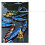 Canoes floating on water by Anonymous