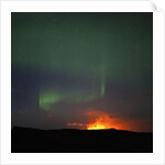 Aurora Borealis over eruption at Eyjafjallajokull glacier by Anonymous