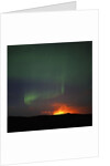 Aurora Borealis over eruption at Eyjafjallajokull glacier by Anonymous
