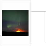 Aurora Borealis over eruption at Eyjafjallajokull glacier by Anonymous