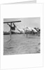 Clothes dry on a wooden line, ca. 1930. by Anonymous
