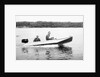 Two brothers speed by in a motor boat on a Wisconsin lake, ca. 1956 by Anonymous
