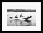 Two brothers speed by in a motor boat on a Wisconsin lake, ca. 1956 by Anonymous