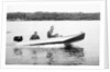 Two brothers speed by in a motor boat on a Wisconsin lake, ca. 1956 by Anonymous