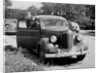 Eighteen year old boy with his first car, ca. 1944 by Anonymous