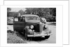 Eighteen year old boy with his first car, ca. 1944 by Anonymous