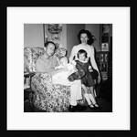 Family group in their living room, ca. 1958 by Anonymous