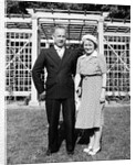 Middle aged couple pose on the lawn, ca. 1939 by Anonymous