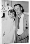 A couple on a date at a costume party pose, ca. 1955 by Anonymous