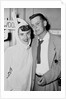 A couple on a date at a costume party pose, ca. 1955 by Anonymous