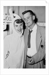 A couple on a date at a costume party pose, ca. 1955 by Anonymous