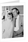 A couple on a date at a costume party pose, ca. 1955 by Anonymous