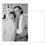 A couple on a date at a costume party pose, ca. 1955 by Anonymous