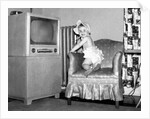 Baby girl wants to watch television, ca. 1954 by Anonymous