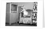 Baby girl wants to watch television, ca. 1954 by Anonymous