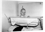 One year old baby girl enjoys her bath, ca. 1953 by Anonymous